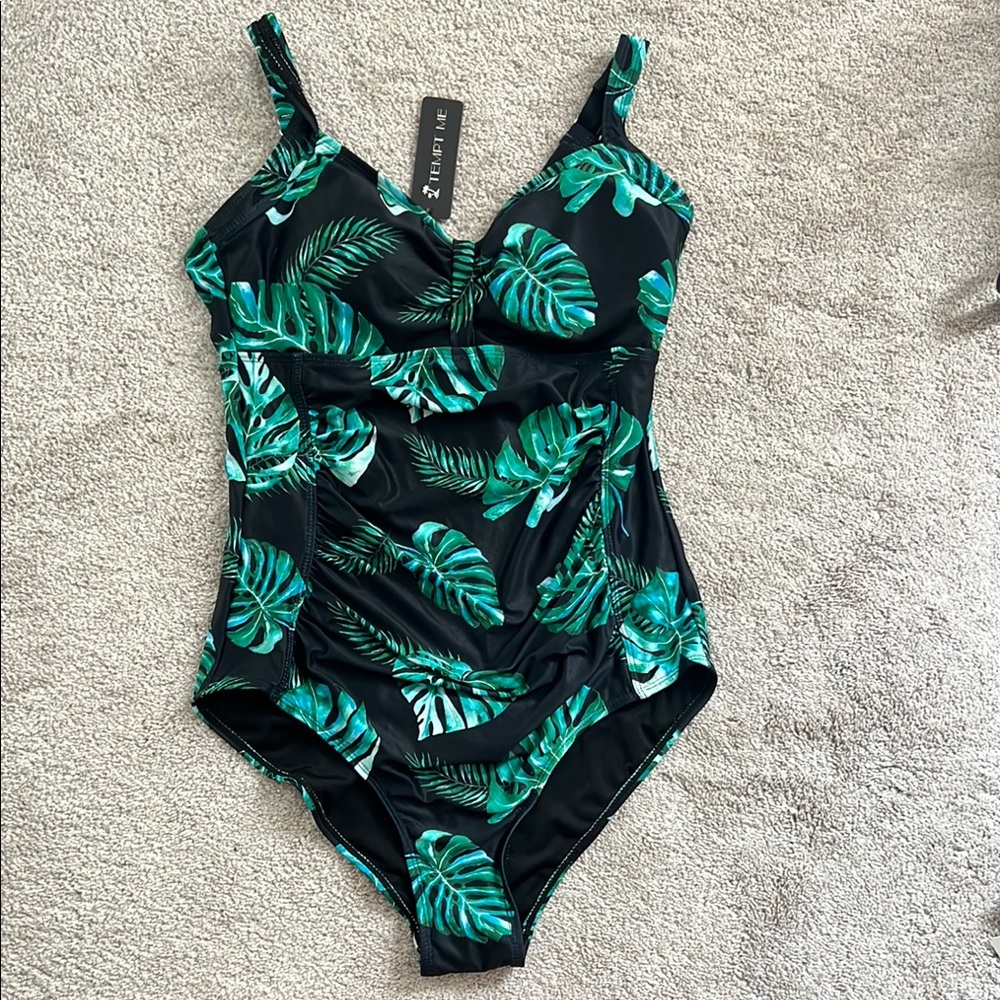 ‘Tempt me’ one piece Size M. Brand new W/tags.